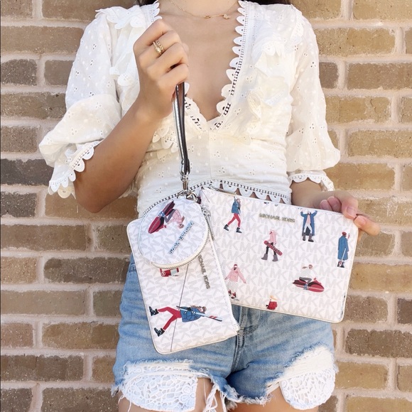 Michael Kors Handbags - Michael Kors Multi Wristlet White Multi Coin Case